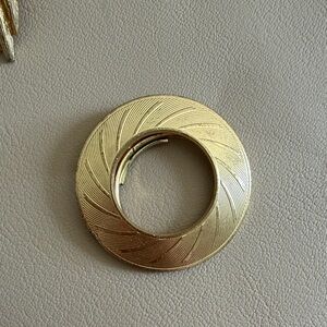 Gold Circular Swirl Brooch Pin